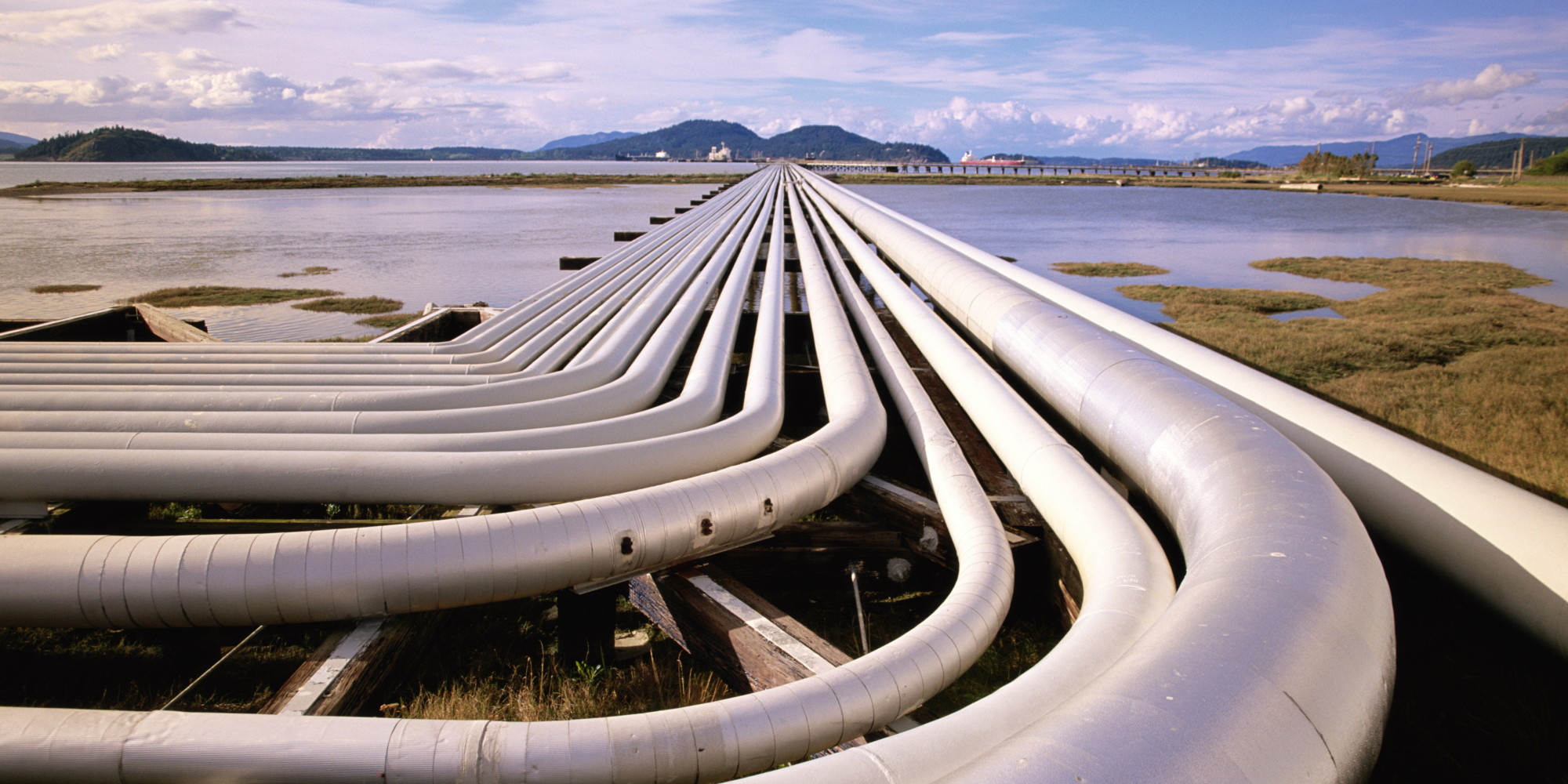 PETROLEUM PIPES AND OIL TANKER AT PIER